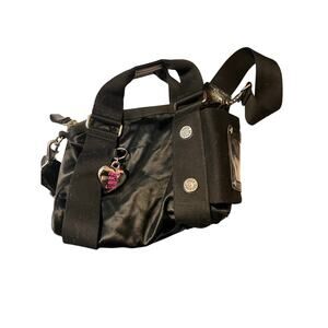 Juicy couture charm bag with luggage hold.